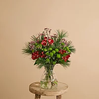 Christmas flower bouquet with alstromeria Santini and pine