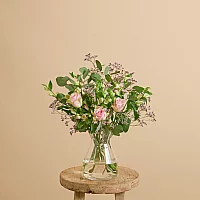 Easter flower bouquet with roses and alstroemerias