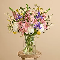 Easter flower bouquet with iris tulips and lilies