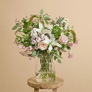Easter flowerbouquet with ranunculus and roses