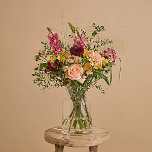 Valentines Day flower bouquet with roses snapdragons and carnations